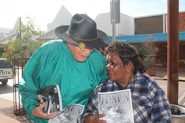 ACTS evangelist Fred Schaeffer with a woman living in the outback of australia